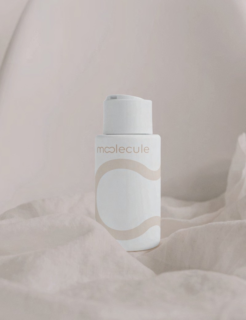 Molecule bijela cilindrična bočica s wave dizajnom na tkanini