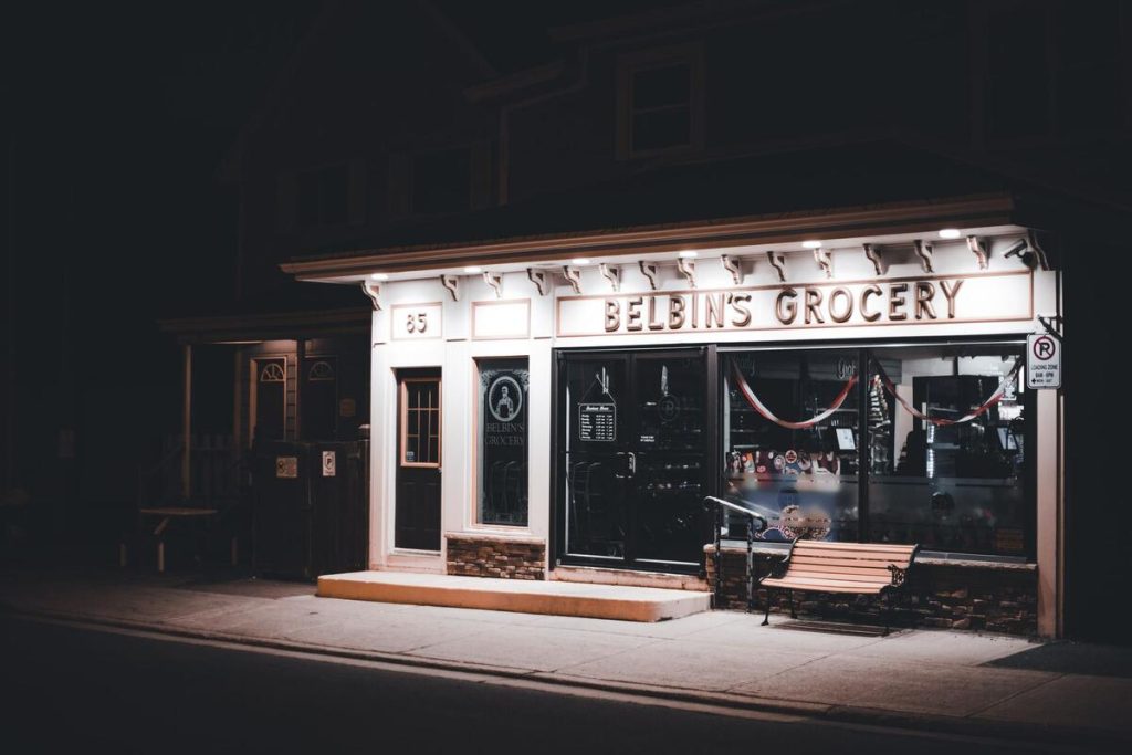 small local shop storefront with a map pin icon overlay, no people