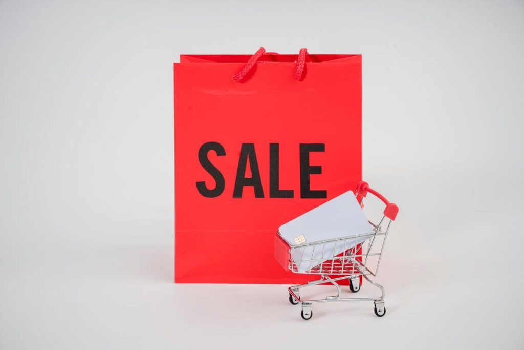 online shopping cart icons over price tags, e-commerce concept, no people