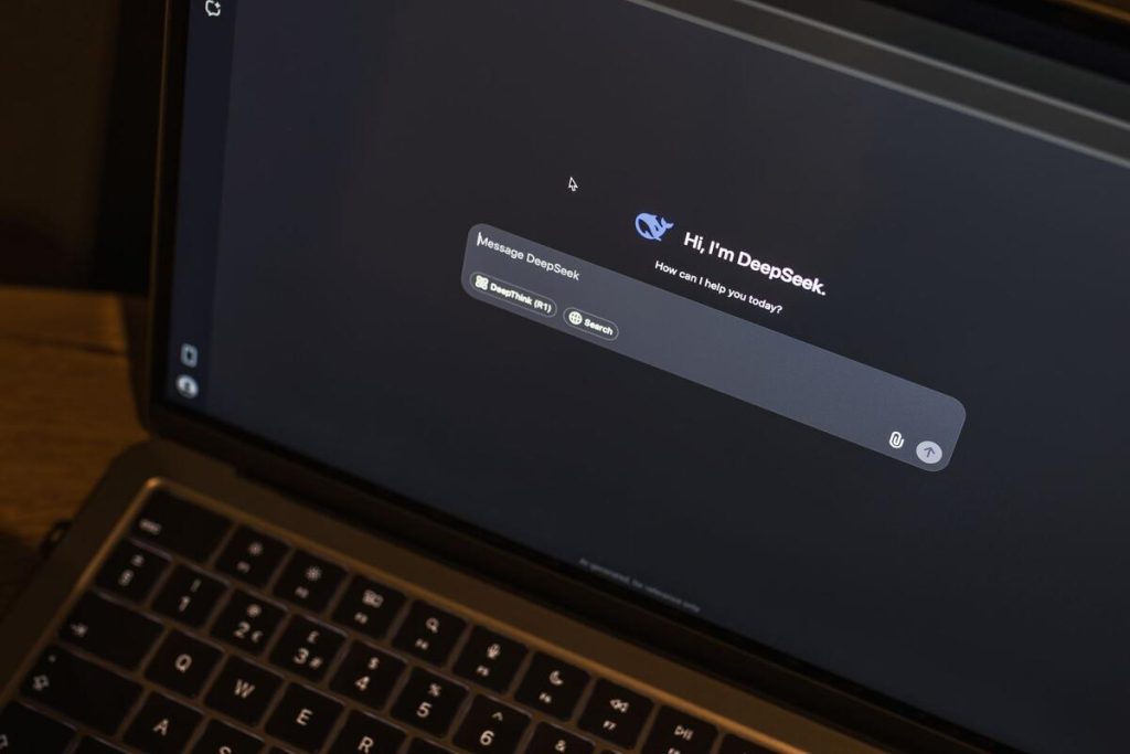 laptop screen displaying a search engine results page with an AI generated summary and clickable links, no people visible